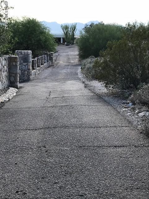 Follow road to sign on left