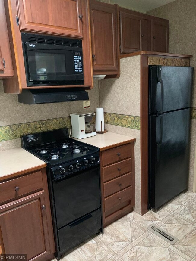Kitchen has full size appliances