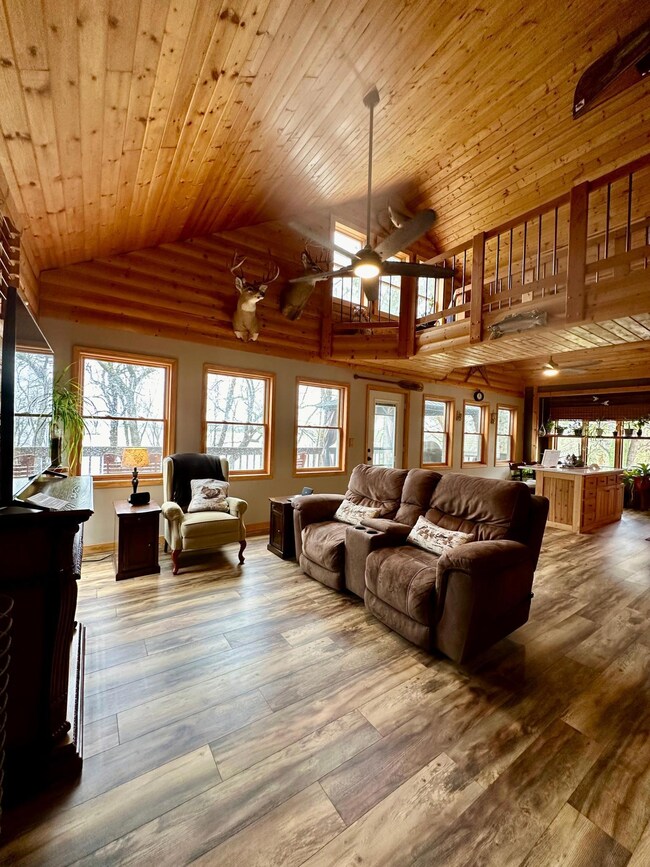 Open concept living room with Lakeview windows