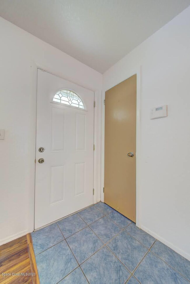 front door & coat closet