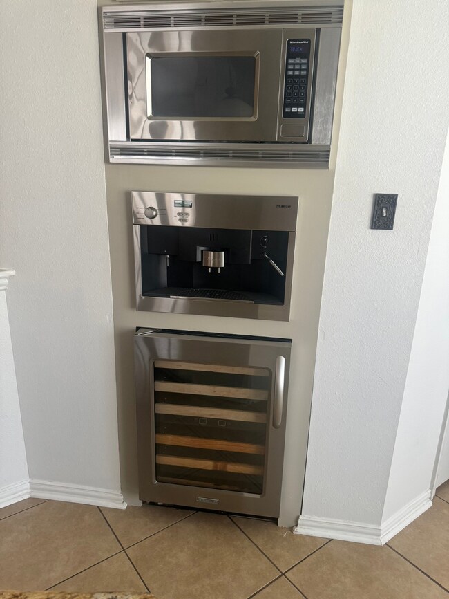 BUILT IN EXPRESSO/COFFEE MAKER/WINE CHILLER/MICROWAVE