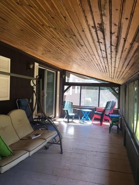 Enclosed porch on the back of the house