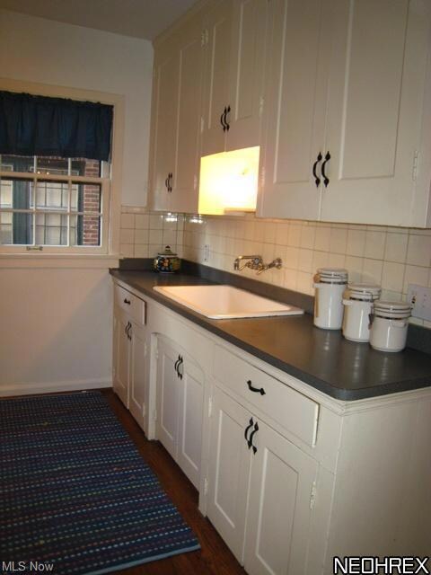 Updated eat-in kitchen in 1st floor unit.