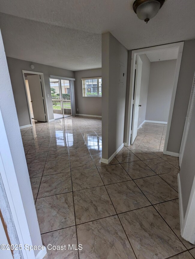 1609 Sunny Brook Ln NE unit E104, Palm Bay, FL 32905 - photo 2