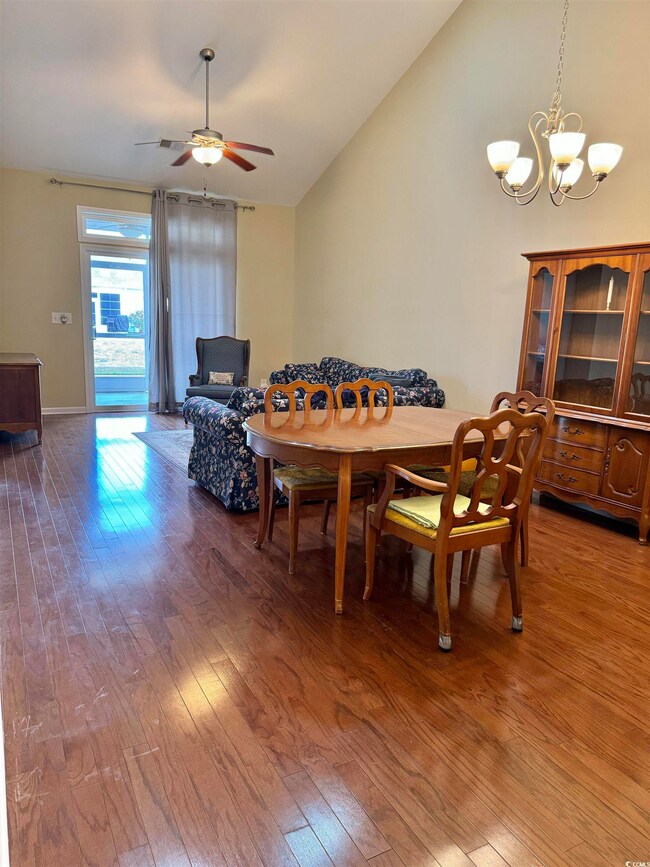 Dining area featuring hardwood / wood-style floors