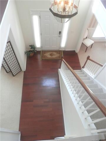 Foyer w/ Hardwoods Opens to Formal Living and Dini