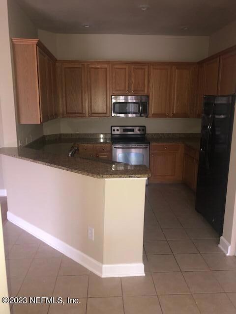 Another view of kitchen 1305