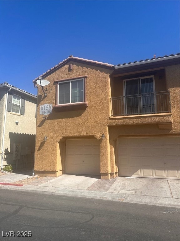 View of front of property featuring stucco siding,