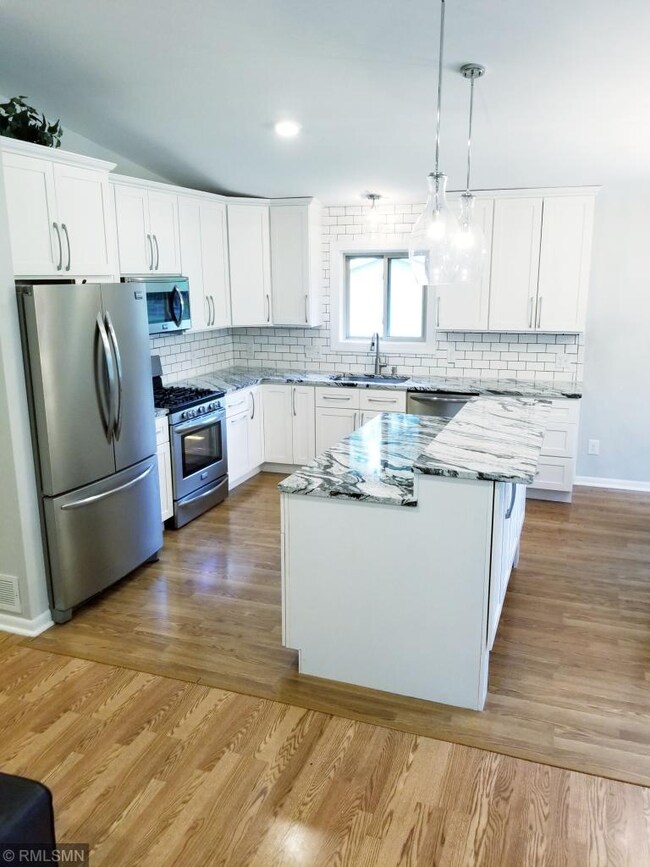 Granite counters and island, convenient for servin