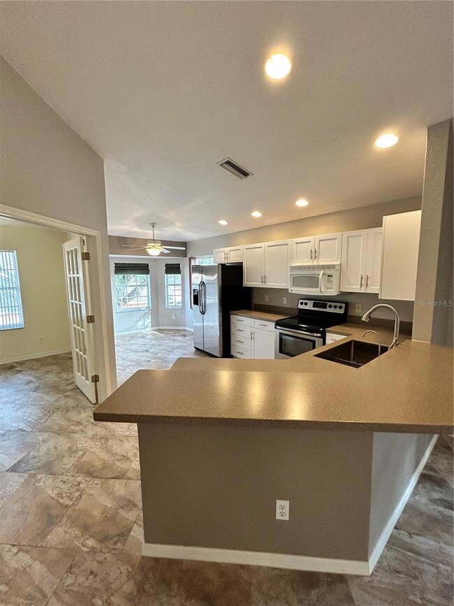 NEWLY RENOVATED  KITCHEN OPEN TO GREAT ROOM