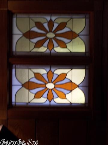 Pretty stained glass window above stairs