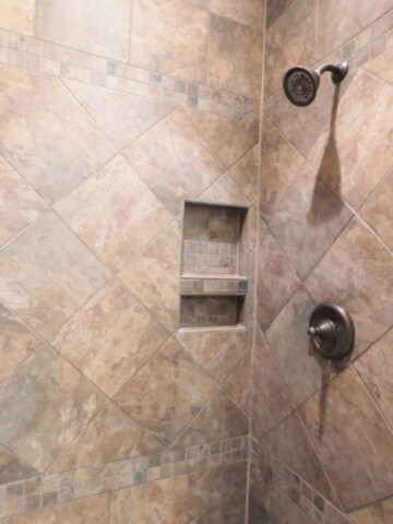 Dream Bath with Custom Tile Shower designed for a 