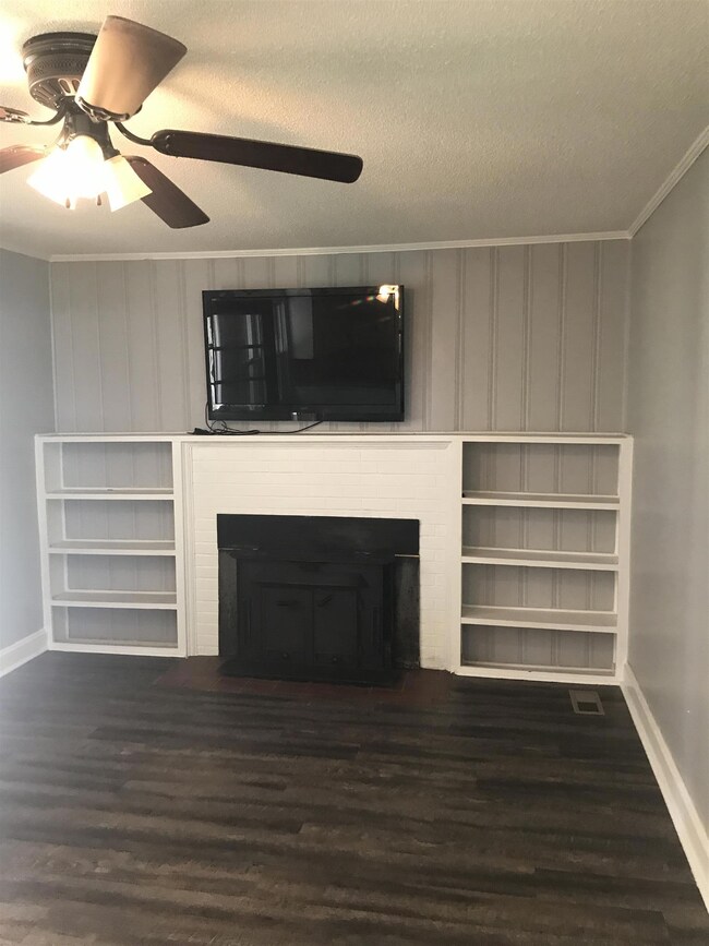 cozy den with working fireplace