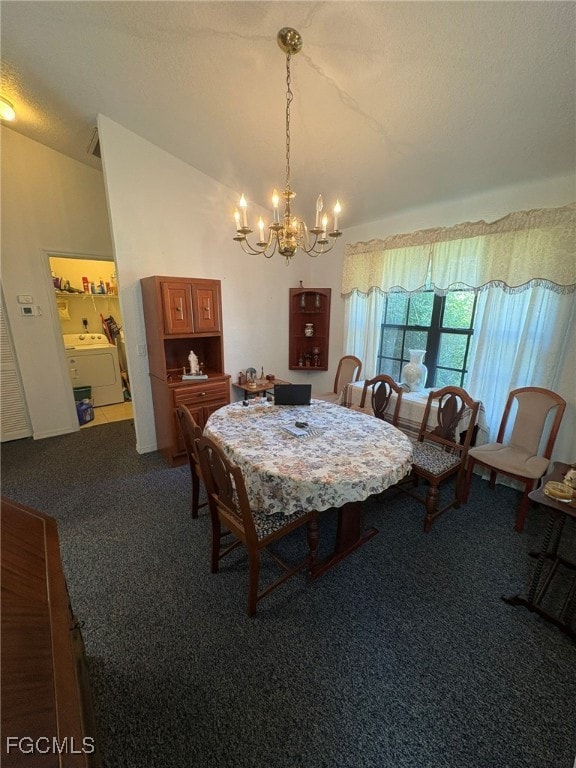 Dining area featuring carpet flooring, a chandelie