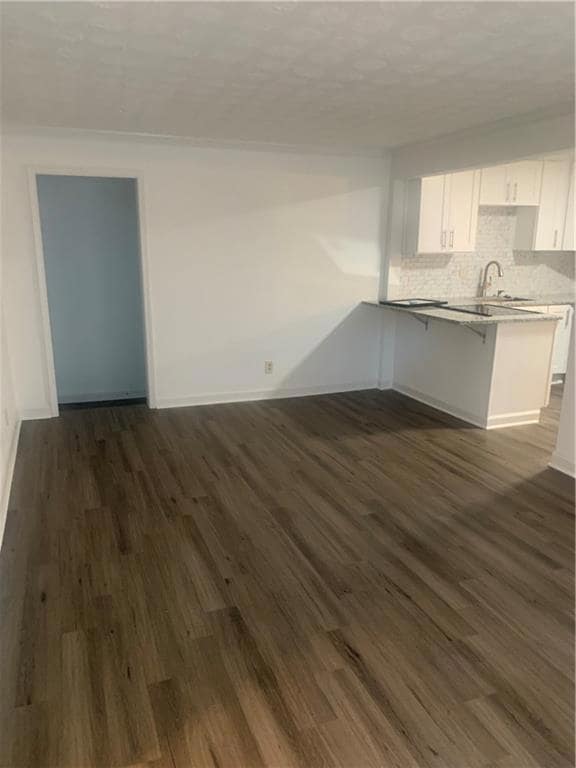 family room  with view of the open kitchen