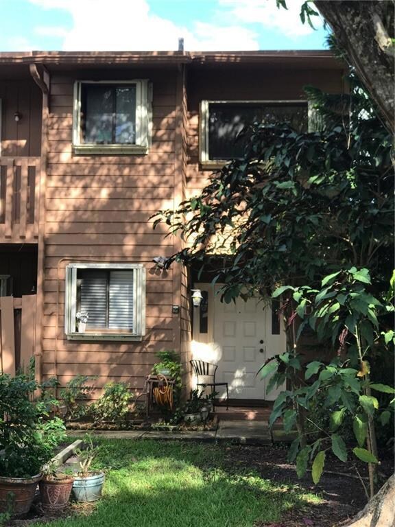 Front of the property showing Shutters on all wind