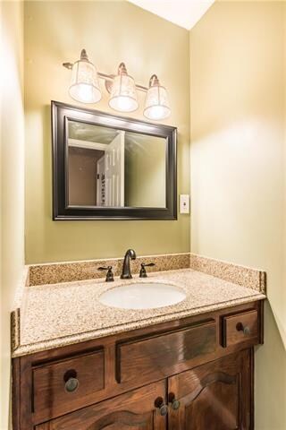 Half bath just as you enter from the garage