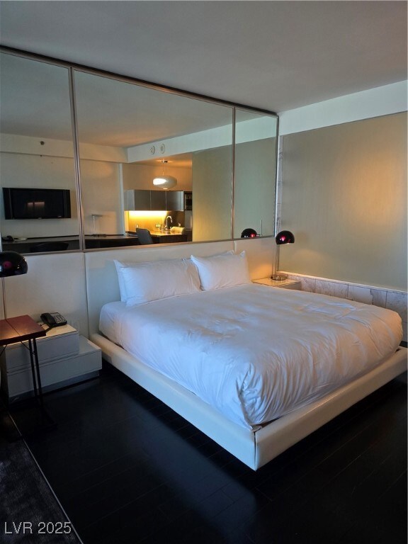 Bedroom featuring wood finished floors
