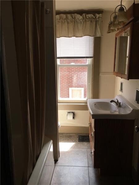 Upstairs unit bathroom.