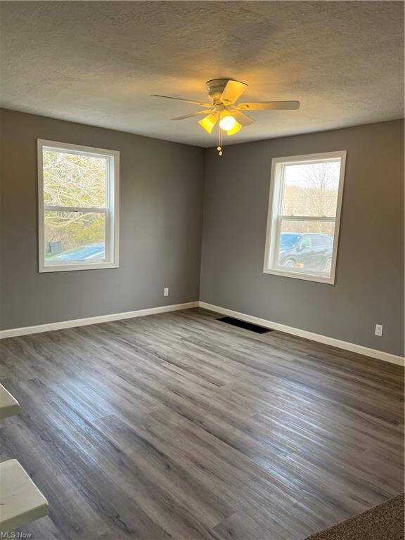 Living room 18 x 10 with new laminate flooring.