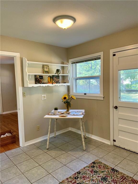 Door opens to backyard. Nice storage in kitchen. L