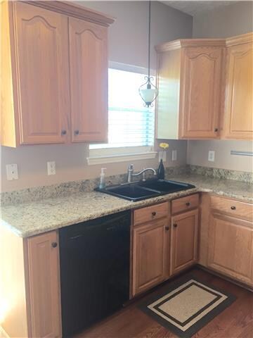 Spacious kitchen to accommodate the family chef! Check out all the cabinet space and granite counter tops. 