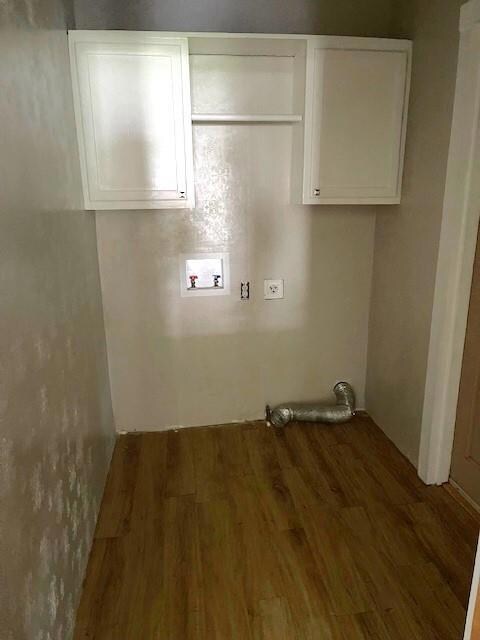 Laundry room featuring cabinets, hookup for a wash