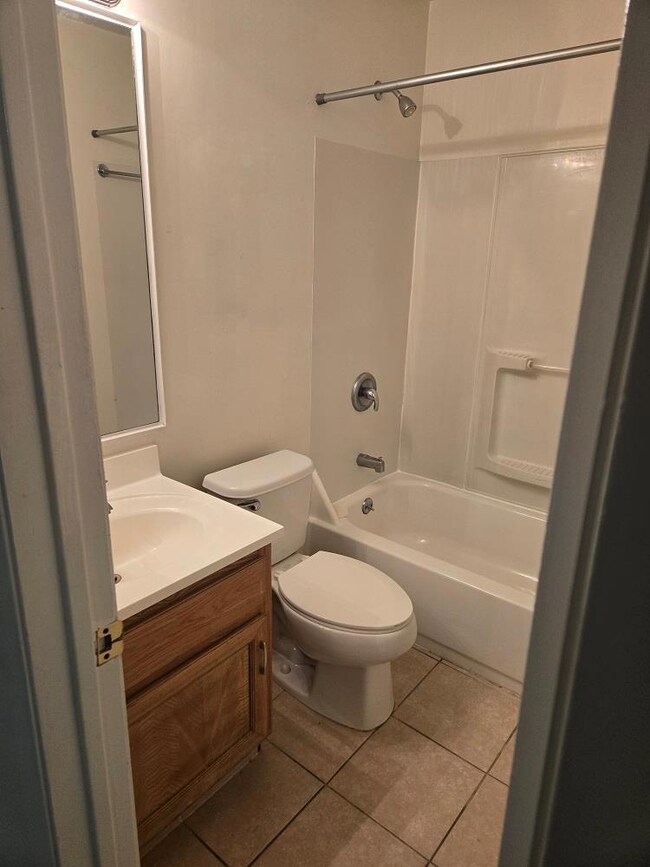 Full bathroom featuring vanity, shower / bathtub 