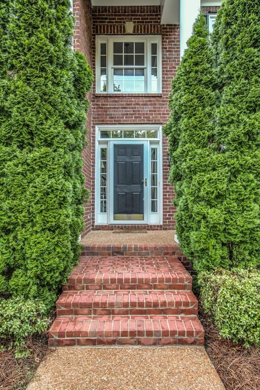 Let's take a short walk up the sidewalk to enter this stately manor.