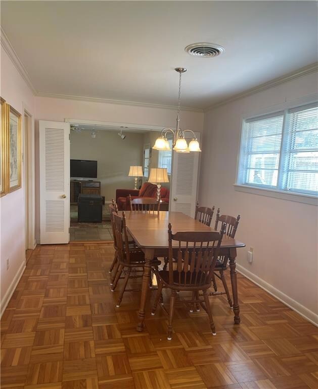 Dining which has folding doors into Den and Kitche