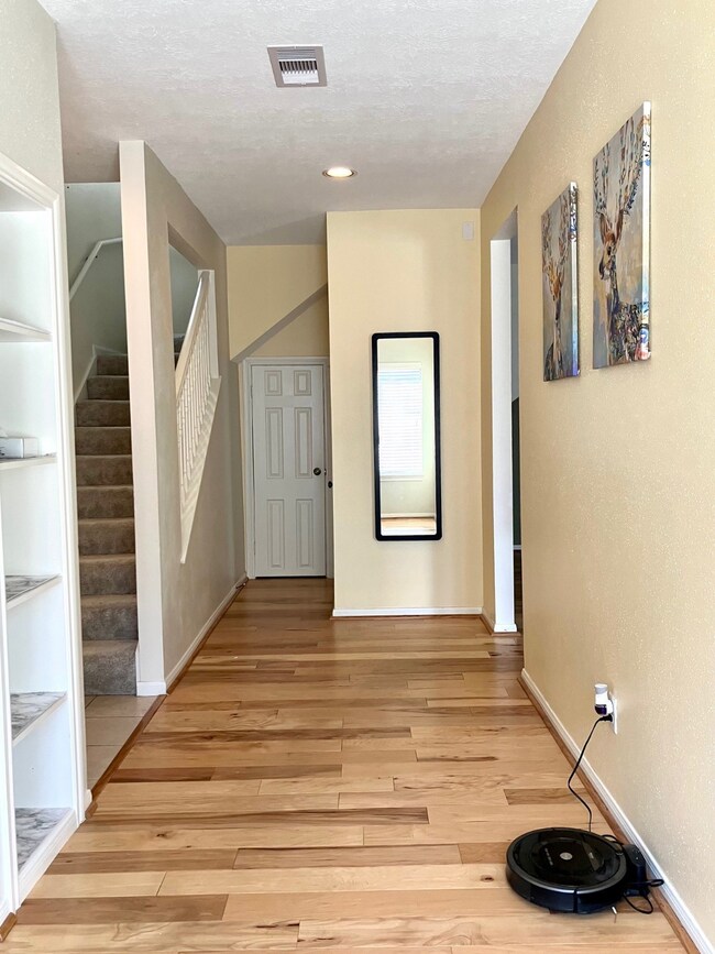 Unit entry with a storage and a half bathroom