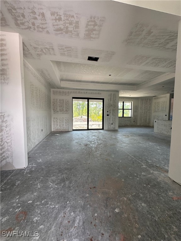View of unfurnished living room at front door