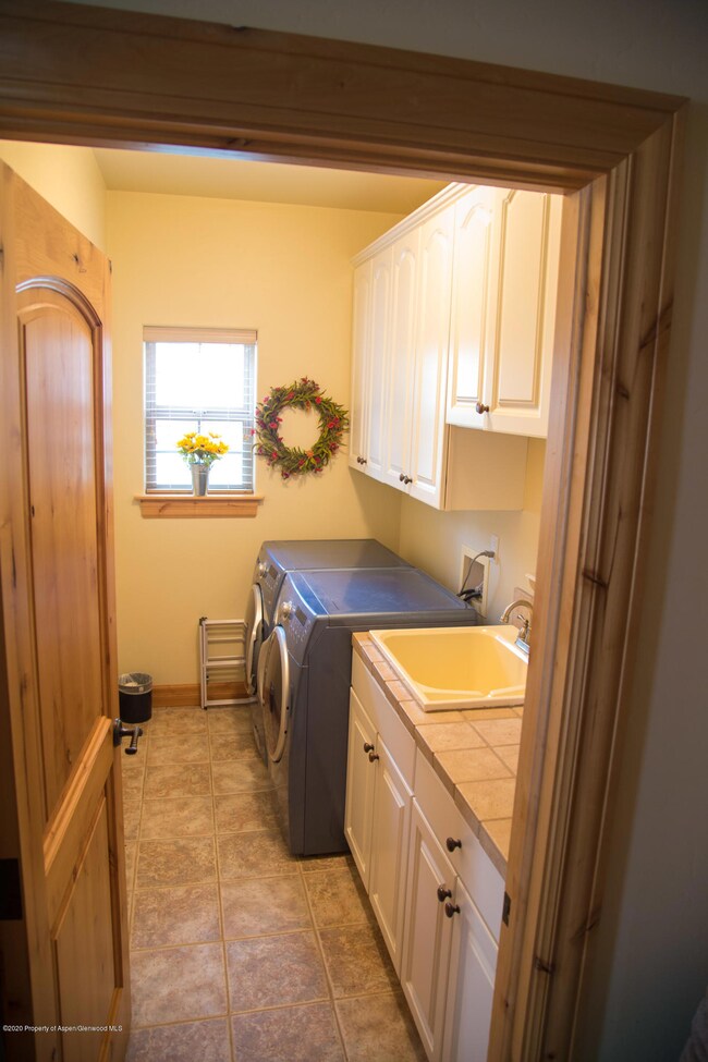 Laundry room with sink