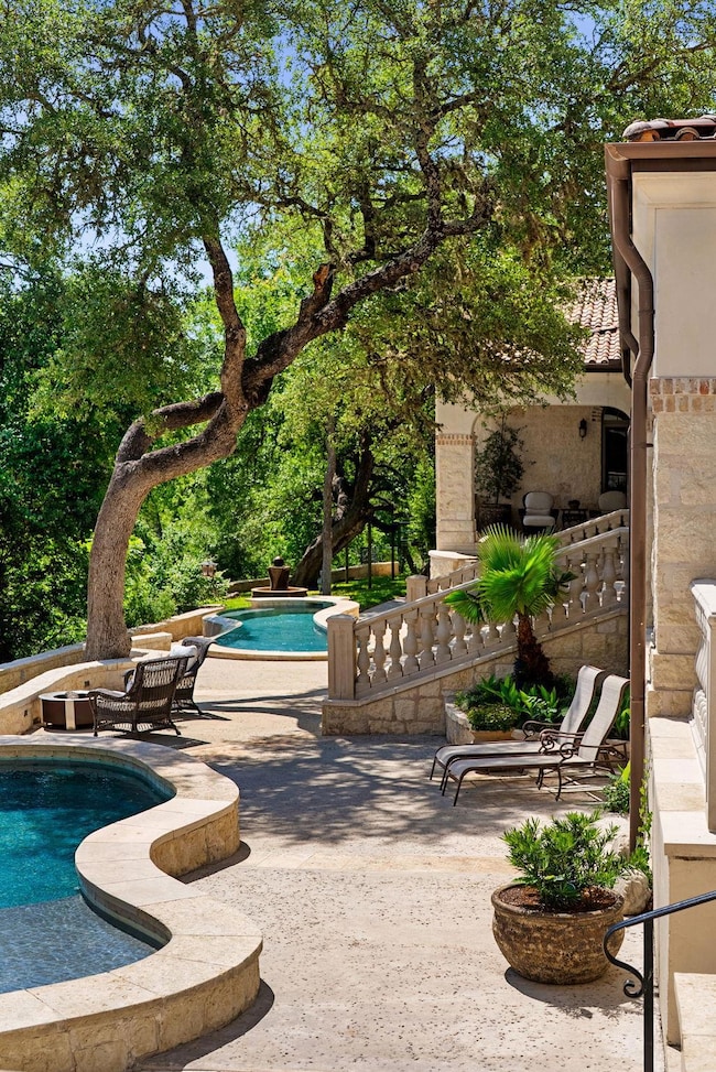 Outdoor pool featuring a patio
