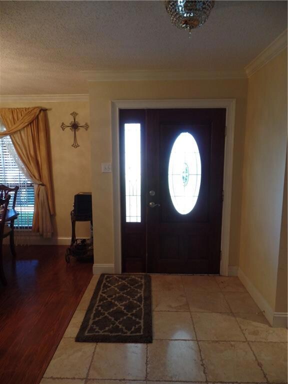 Foyer, Solid wood door with lead beveled glass