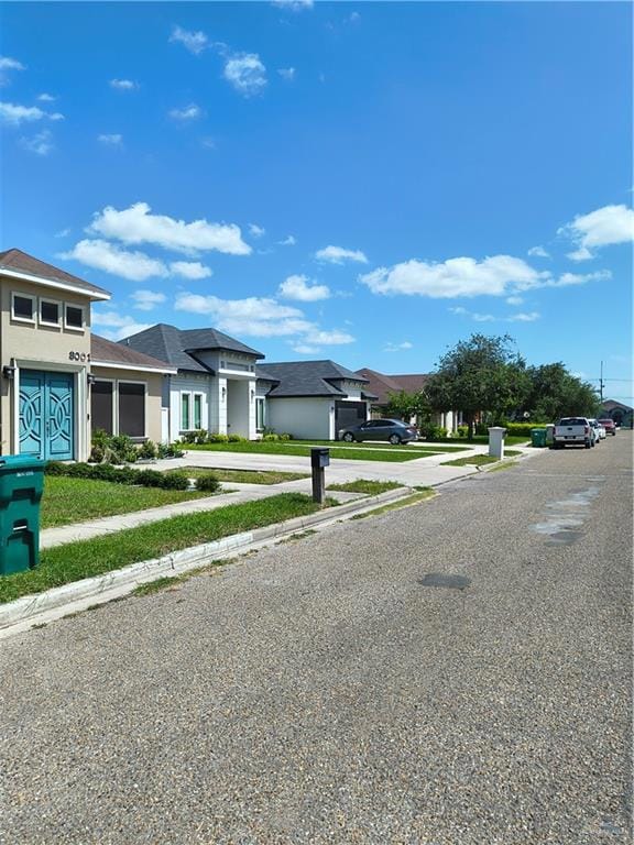 View of front of house with stucco siding