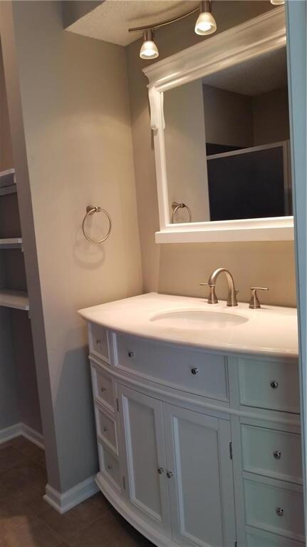 New vanity, lights and mirror in master bath! Plen