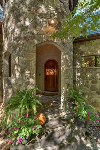 Turret Entry with handmade Amish door