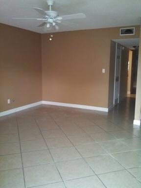 Spacious Living Room with tile flooring