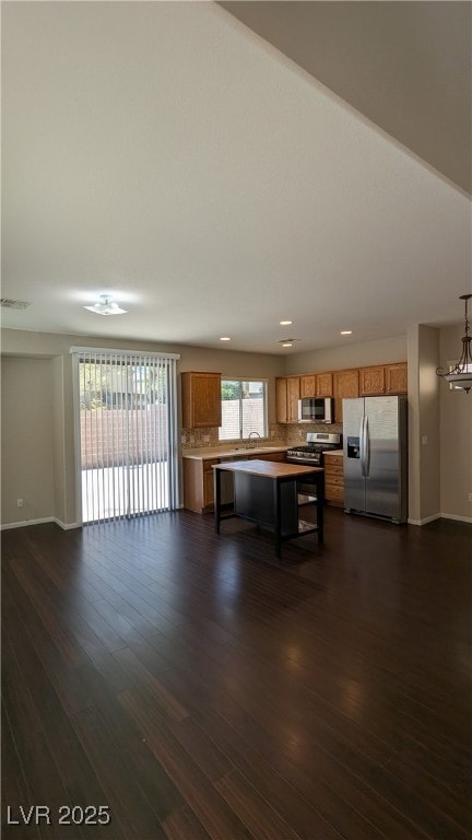 Kitchen with appliances with stainless steel finis