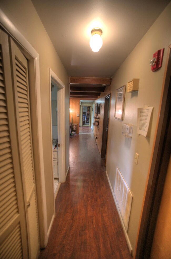 long hallway leading off to various bedrooms