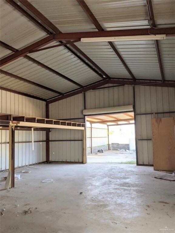 Garage featuring metal wall