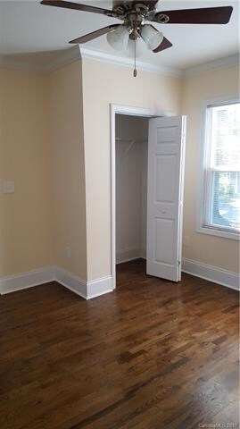 Front Bedroom with lots of windows and ceiling fan