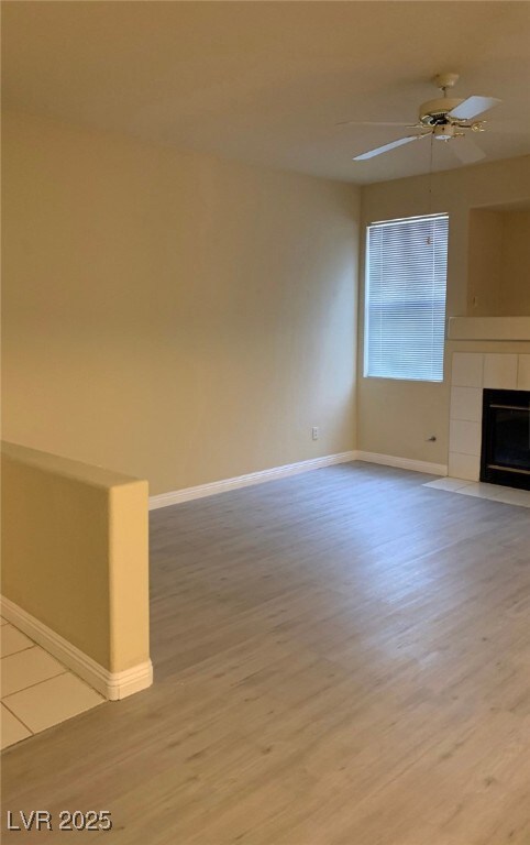 Unfurnished living room with light wood-type floor