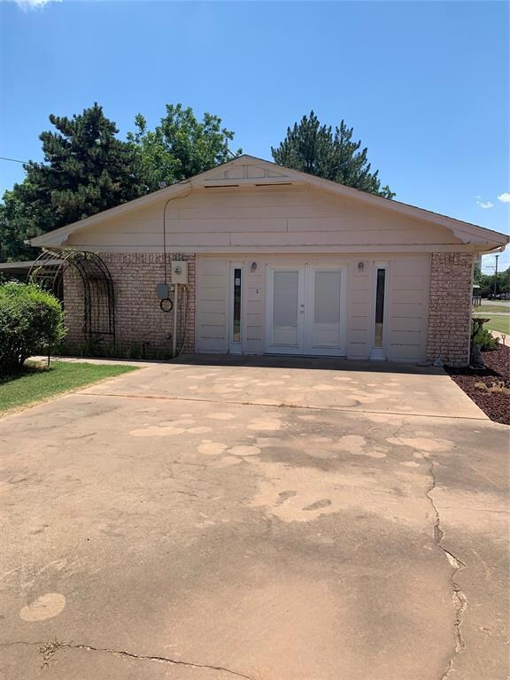 View of front of house featuring french doors