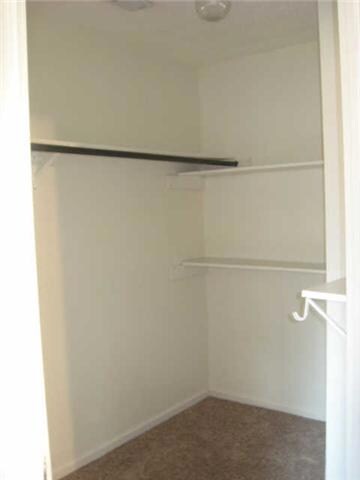 Walk in closet in master bathroom
