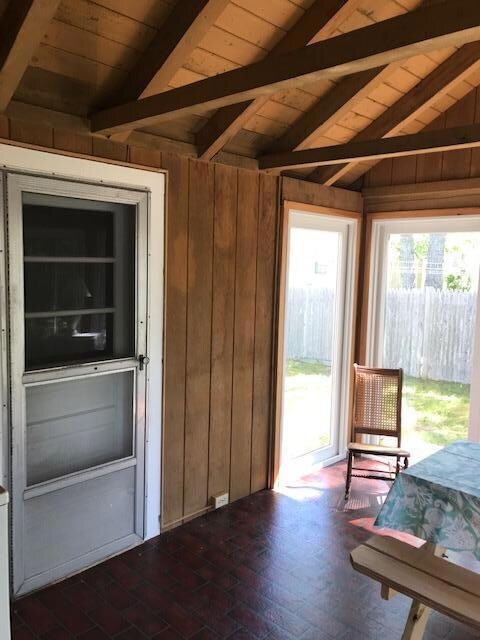 Sunroom with garage access