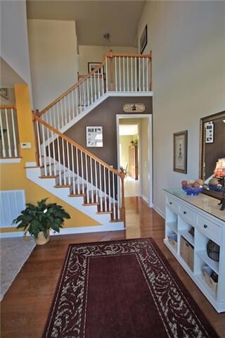 2 Story Foyer with Hardwood Flooring