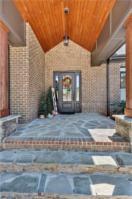 Welcoming front porch with ample parking
