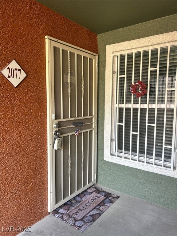 Front door with security gates. 2nd floor
